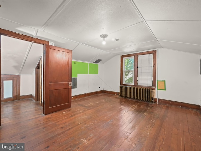 1812 64th Ave, Landover, MD 20785 - additional living space with radiator, baseboards, wood-type flooring, and lofted ceiling