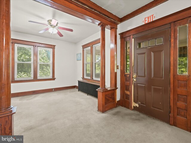 1812 64th Ave, Landover, MD 20785 - foyer entrance featuring decorative columns, carpet floors, plenty of natural light, and ceiling fan