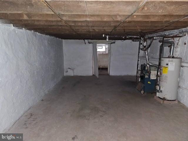 basement featuring water heater