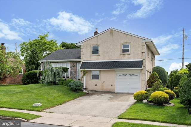 view of front of house featuring asphalt driveway, a front yard, and an attached garage