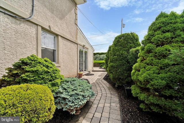 view of home's exterior with stucco siding