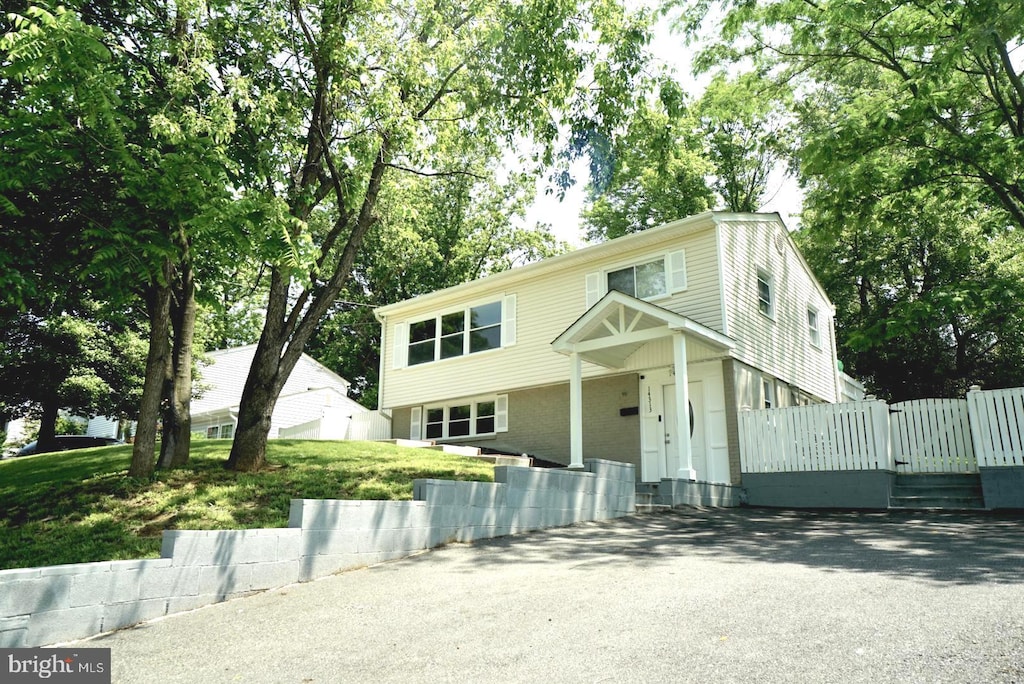 14313 Randall Dr, Woodbridge, VA 22191 - view of front of home with a gate