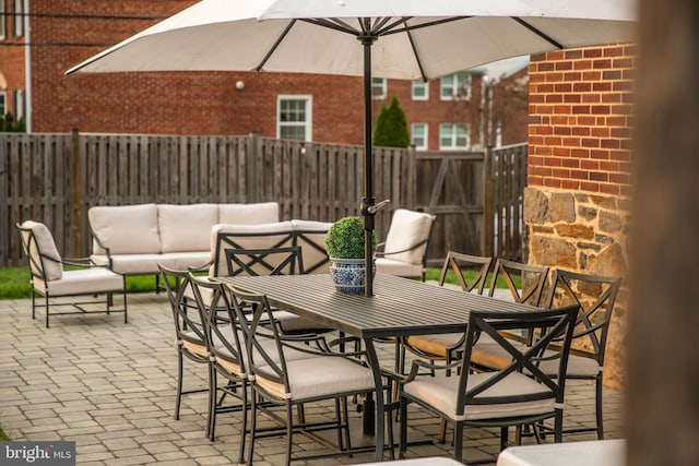 2 Murdock Rd, Baltimore, MD 21212 - fenced backyard featuring a patio, an outdoor hangout area, and outdoor dining area