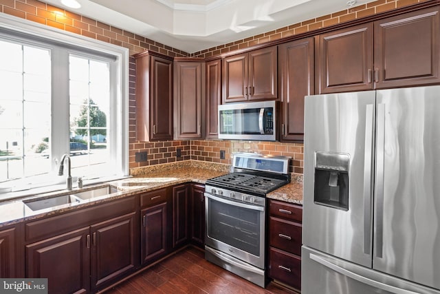 21 Whaleback Ln, Fredericksburg, VA 22406 - kitchen with appliances with stainless steel finishes, a sink, light stone countertops, decorative backsplash, and ornamental molding