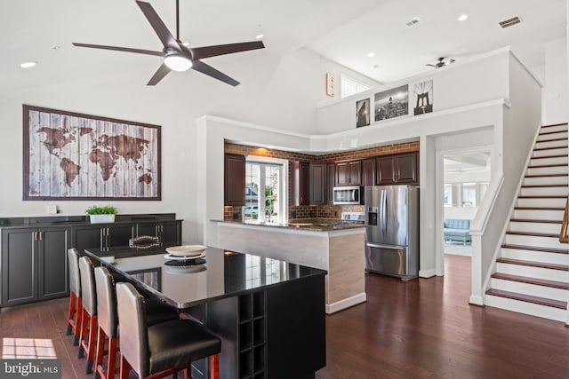 21 Whaleback Ln, Fredericksburg, VA 22406 - kitchen with appliances with stainless steel finishes, a center island, dark wood-type flooring, ceiling fan, and recessed lighting