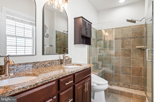 21 Whaleback Ln, Fredericksburg, VA 22406 - bathroom with a stall shower, toilet, and double vanity