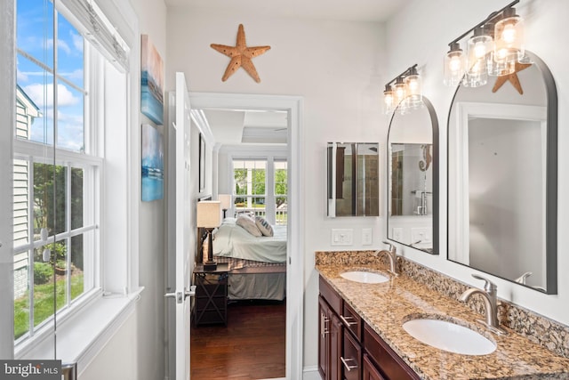 21 Whaleback Ln, Fredericksburg, VA 22406 - ensuite bathroom with healthy amount of natural light, wood finished floors, and double vanity