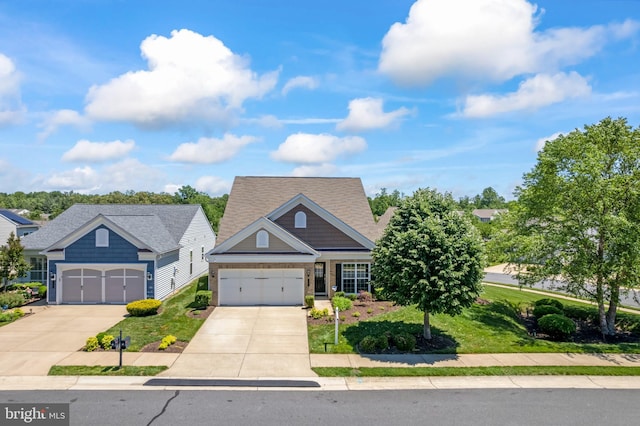 21 Whaleback Ln, Fredericksburg, VA 22406 - view of front facade featuring driveway, a shingled roof, a garage, and brick siding