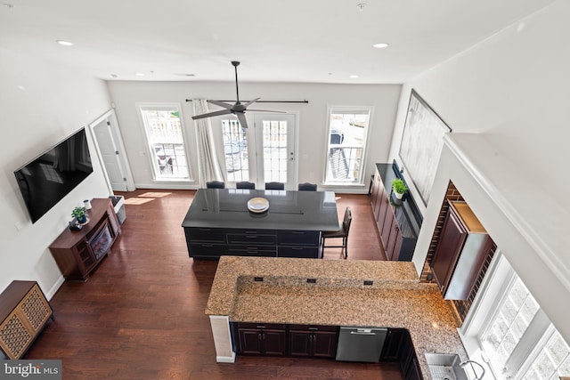 21 Whaleback Ln, Fredericksburg, VA 22406 - living room featuring a ceiling fan, dark wood-style floors, baseboards, recessed lighting, and a glass covered fireplace