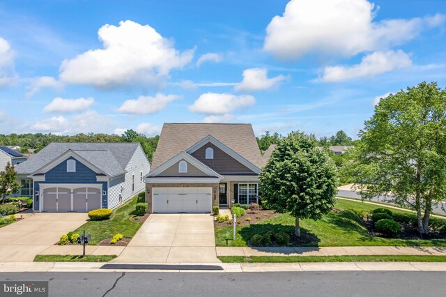 21 Whaleback Ln, Fredericksburg, VA 22406 - view of front facade featuring driveway, a shingled roof, a garage, and brick siding