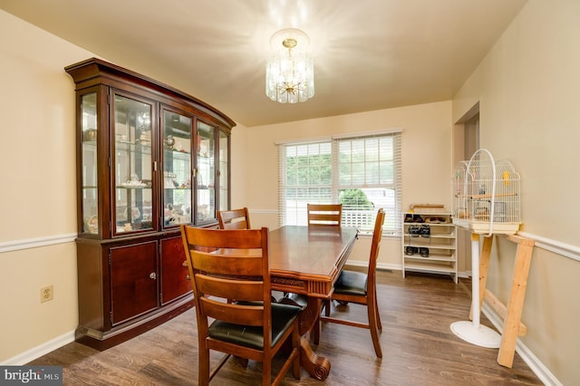 1533 Meadowview Dr, Pottstown, PA 19464 - dining area featuring a chandelier, dark wood-style floors, and baseboards
