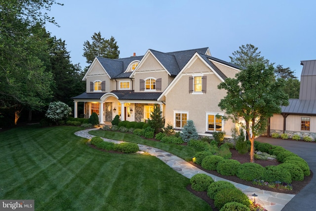 6529 Sothoron Rd, Mclean, VA 22101 - shingle-style home with a standing seam roof, a front lawn, metal roof, a chimney, and covered porch