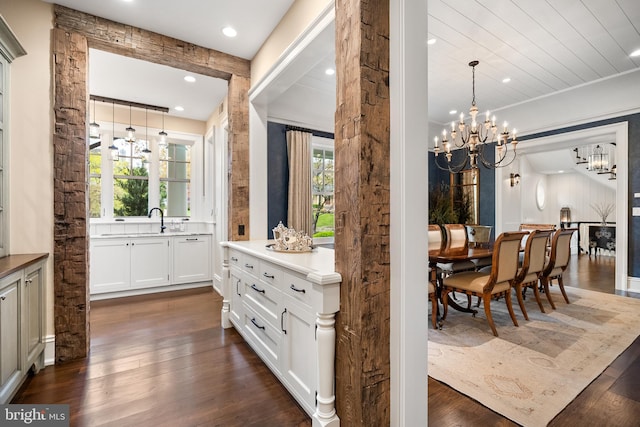 6529 Sothoron Rd, Mclean, VA 22101 - dining area with a chandelier, dark wood-style flooring, and recessed lighting