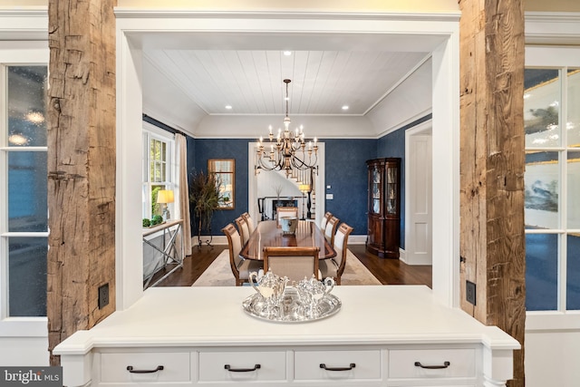 6529 Sothoron Rd, Mclean, VA 22101 - dining space with a chandelier, wood finished floors, wood ceiling, ornamental molding, and baseboards