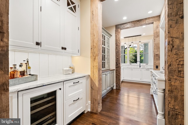 6529 Sothoron Rd, Mclean, VA 22101 - indoor dry bar featuring beverage cooler, dark wood-style floors, and recessed lighting