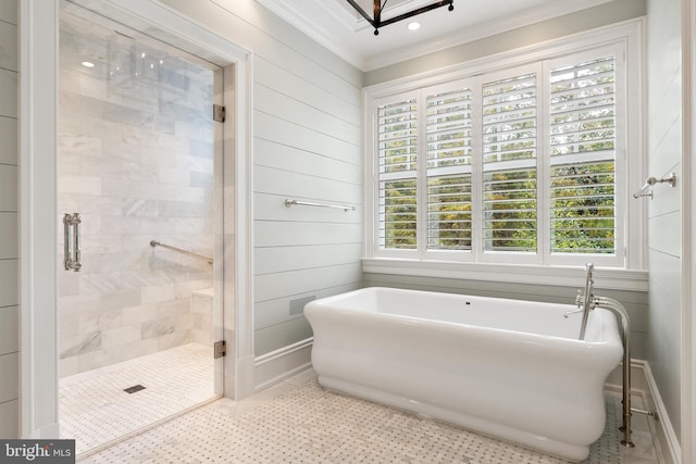 6529 Sothoron Rd, Mclean, VA 22101 - bathroom featuring ornamental molding, a stall shower, a freestanding bath, and tile patterned flooring