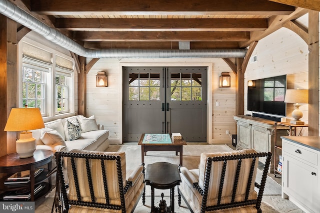 6529 Sothoron Rd, Mclean, VA 22101 - living room featuring wood walls, plenty of natural light, french doors, and wooden ceiling with exposed beams