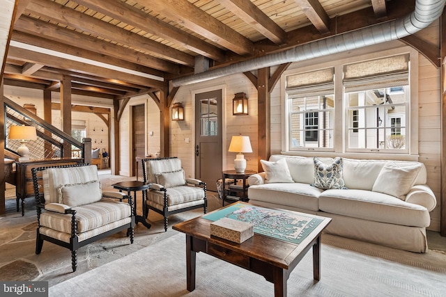 6529 Sothoron Rd, Mclean, VA 22101 - living area with wood ceiling with exposed beams, healthy amount of natural light, and wooden walls