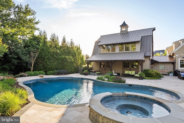 6529 Sothoron Rd, Mclean, VA 22101 - view of pool with a patio area, a pool with connected hot tub, and an outdoor hangout area