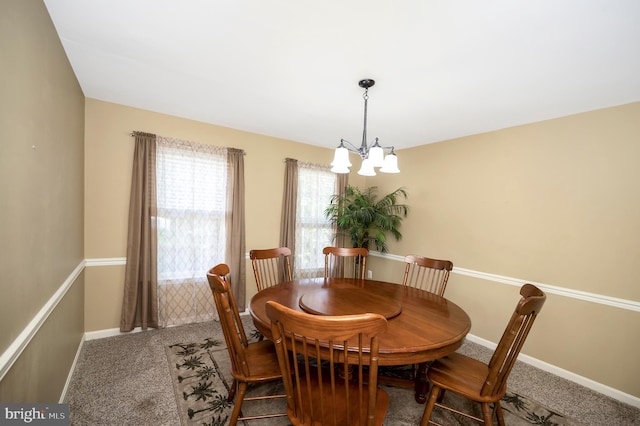 24 Cross Cut Ln, Fredericksburg, VA 22405 - carpeted dining area with a chandelier and baseboards