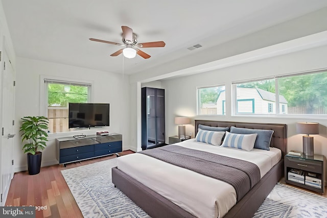 5923 Westridge Ct, Alexandria, VA 22310 - bedroom with wood finished floors, a ceiling fan, and baseboards