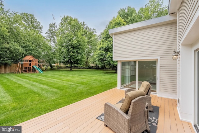 5923 Westridge Ct, Alexandria, VA 22310 - deck featuring a playground and view of wooded area