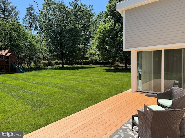5923 Westridge Ct, Alexandria, VA 22310 - wooden deck featuring a lawn and a playground