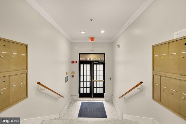 2633 Adams Mill Rd NW Unit 103, Washington, DC 20009 - foyer entrance featuring baseboards, mail area, crown molding, and recessed lighting