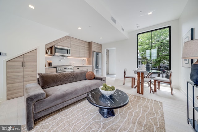 2907 Newark St NW, Washington, DC 20008 - living area featuring baseboards and recessed lighting