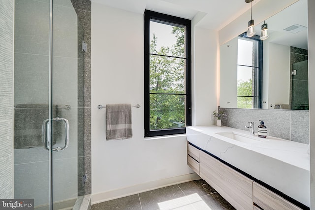 2907 Newark St NW, Washington, DC 20008 - bathroom featuring healthy amount of natural light, a stall shower, and baseboards