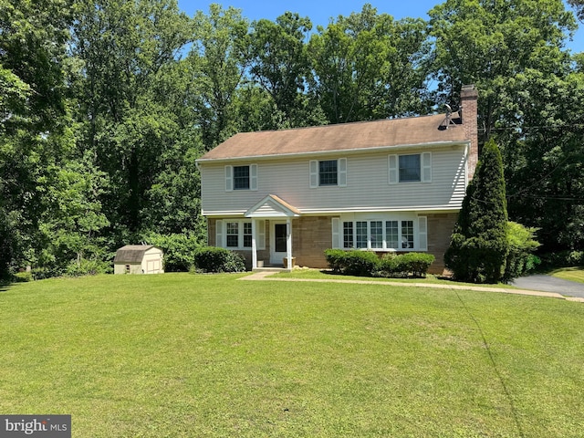 3901 Glenbrook Rd, Fairfax, VA 22031 - colonial house with a front lawn and a chimney