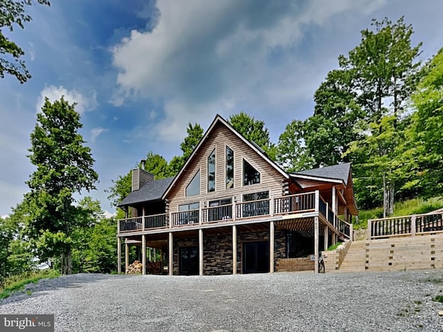 966 Fork Run Trl, Mc Henry, MD 21541 - log cabin featuring a deck, stone siding, a chimney, gravel driveway, and stairway