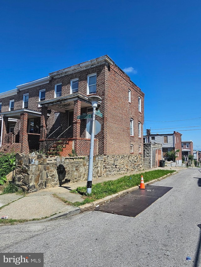 view of home's exterior featuring brick siding