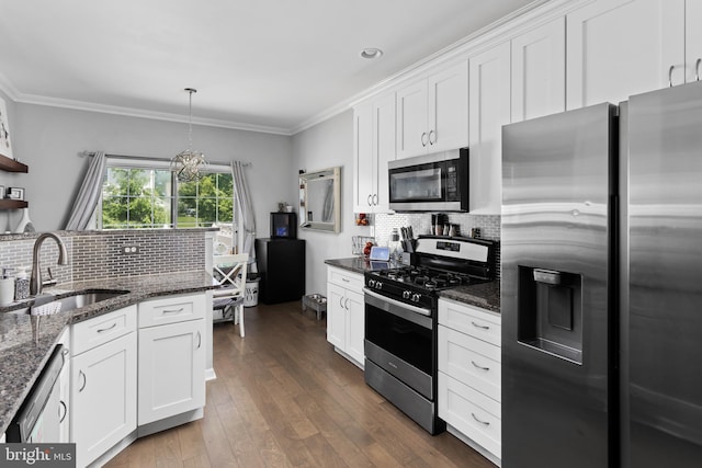 14 Barclay Ct, Bordentown, NJ 08505 - kitchen with appliances with stainless steel finishes, a sink, decorative backsplash, white cabinets, and ornamental molding