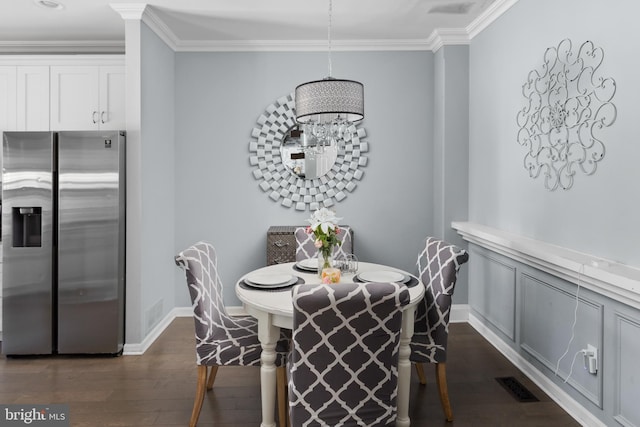 14 Barclay Ct, Bordentown, NJ 08505 - dining area with dark wood-type flooring, ornamental molding, baseboards, and a chandelier