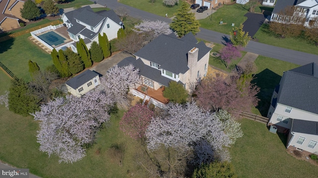 aerial overview of property's location featuring nearby suburban area