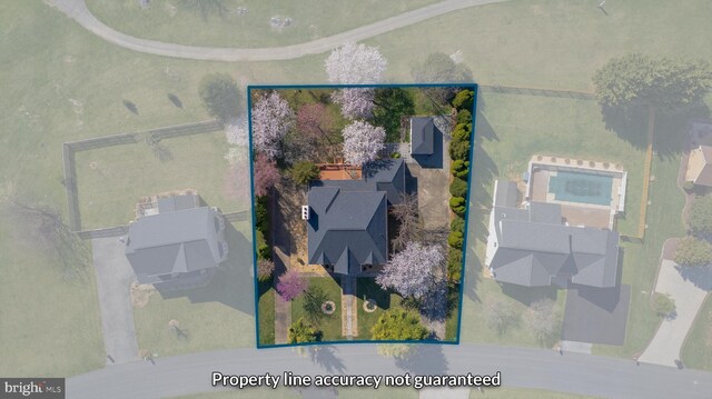 aerial overview of property's location with property parcel outlined