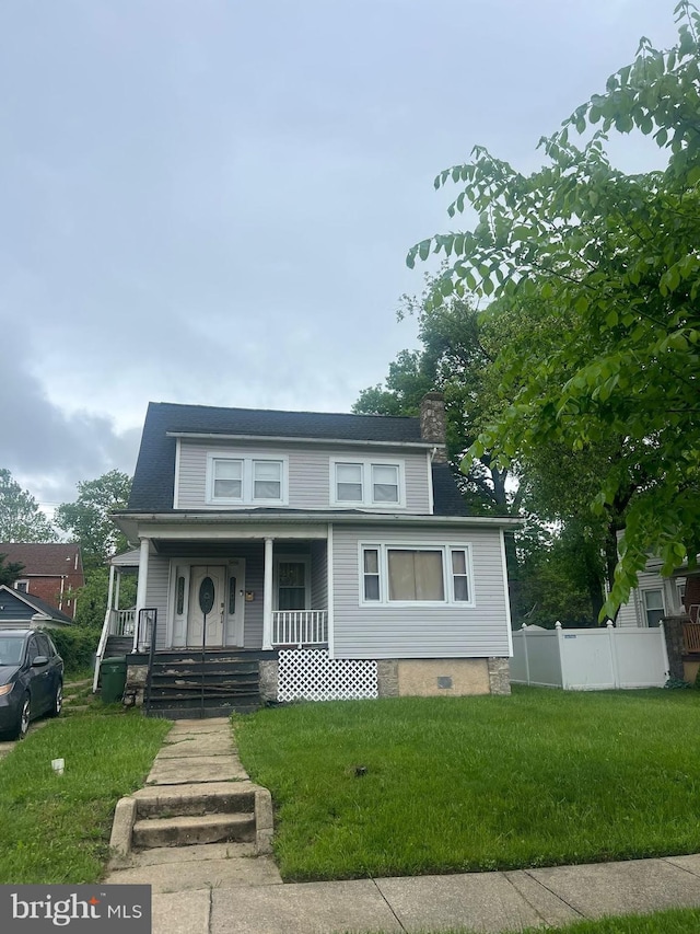 bungalow-style house featuring a porch and a chimney