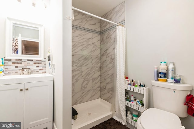 6402 Browning Rd, Pennsauken, NJ 08109 - bathroom featuring toilet, vanity, a shower stall, and tasteful backsplash