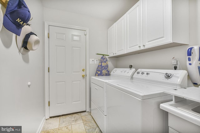 981 Old Holly Dr, Great Falls, VA 22066 - laundry room featuring cabinet space, separate washer and dryer, and baseboards