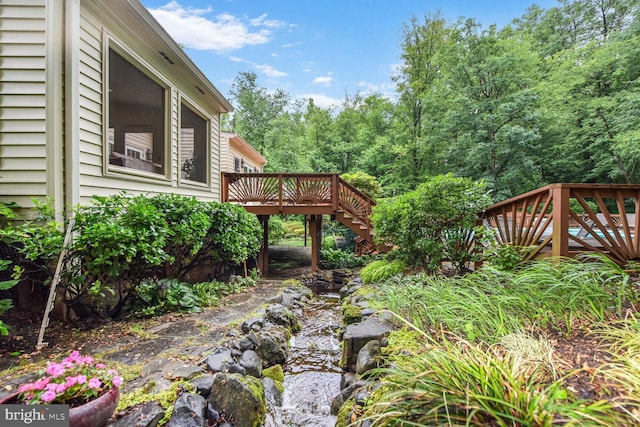 981 Old Holly Dr, Great Falls, VA 22066 - view of yard with a deck and stairs