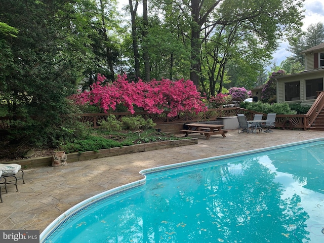 981 Old Holly Dr, Great Falls, VA 22066 - swimming pool with a patio