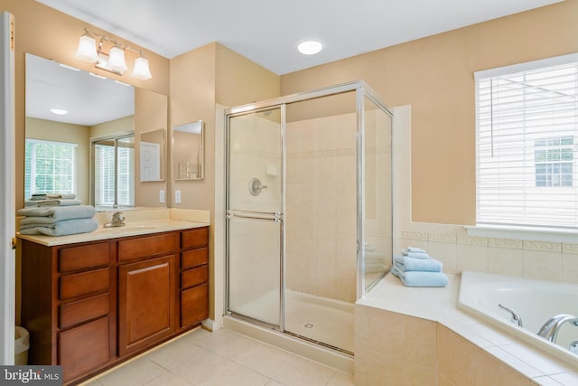 128 Bay Club Pkwy, North East, MD 21901 - full bathroom with a garden tub, a shower stall, vanity, and tile patterned flooring