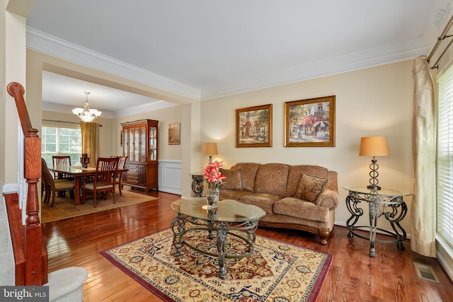 128 Bay Club Pkwy, North East, MD 21901 - living room featuring hardwood / wood-style floors, crown molding, and a chandelier