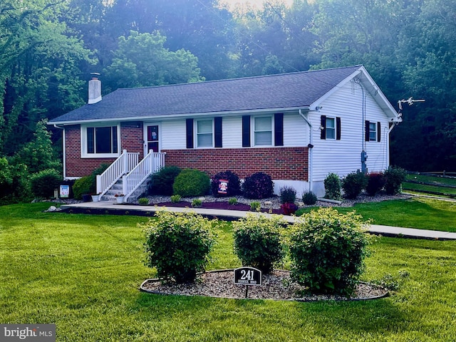 241 Fenwick Rd, Woodstown, NJ 08098 - ranch-style house with brick siding, a chimney, and a front lawn