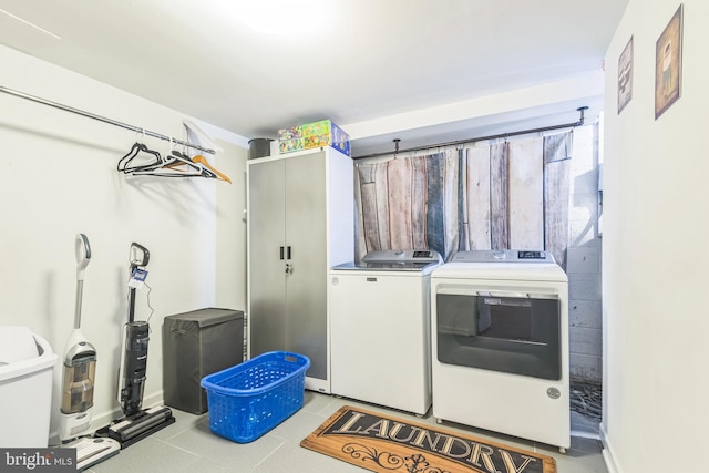241 Fenwick Rd, Woodstown, NJ 08098 - laundry area featuring separate washer and dryer and light tile patterned floors