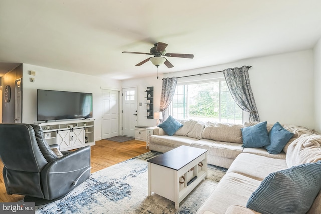 241 Fenwick Rd, Woodstown, NJ 08098 - living area with a ceiling fan and light wood-style flooring