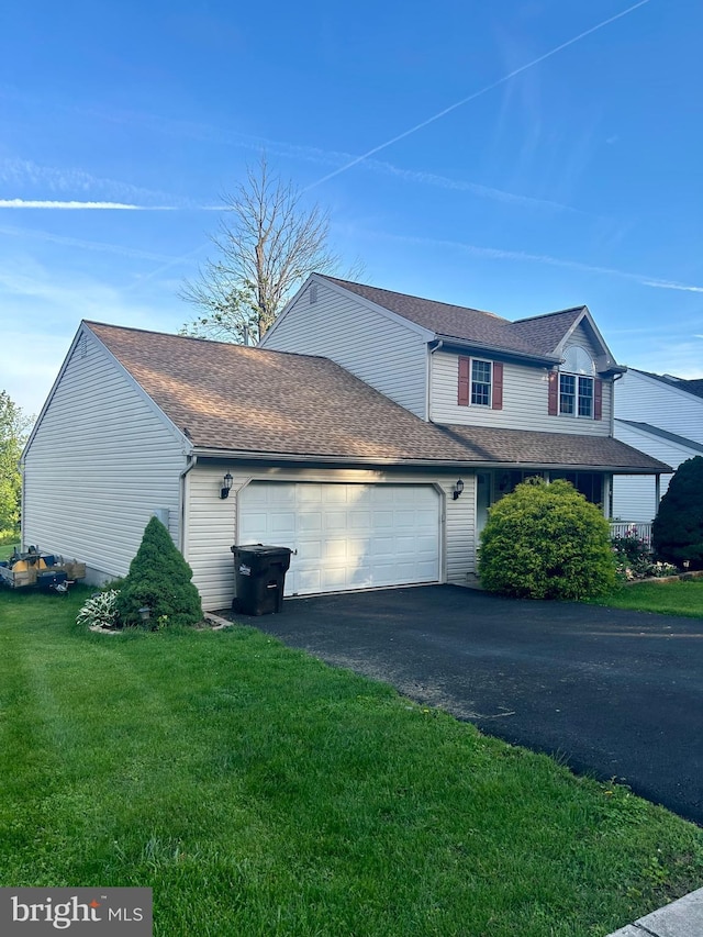 4180 Hunters Run Blvd, Reading, PA 19606 - view of home's exterior with an attached garage, a yard, asphalt driveway, and a shingled roof
