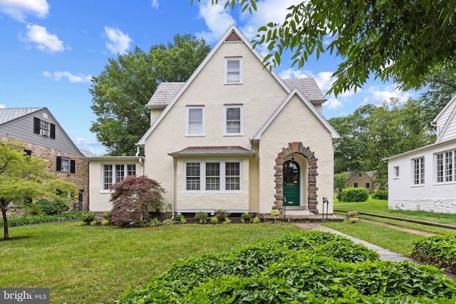 4404 Eastway, Baltimore, MD 21218 - english style home with stucco siding and a front yard