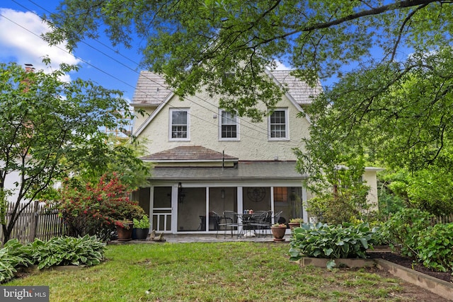 4404 Eastway, Baltimore, MD 21218 - back of house featuring a sunroom and a patio